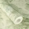 Unsere  betonhatású alapon mohazöld nagy levélmotívumos tapéta
