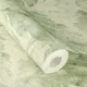 Unsere  betonhatású alapon mohazöld nagy levélmotívumos tapéta