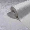 Fénylő drappos vakolathatású PIA tapéta82596