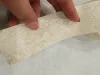 Dekorál LUX elegáns finoman csillogó arany bézs színű betonhatást keltő tapétaszegély 5cm G5
